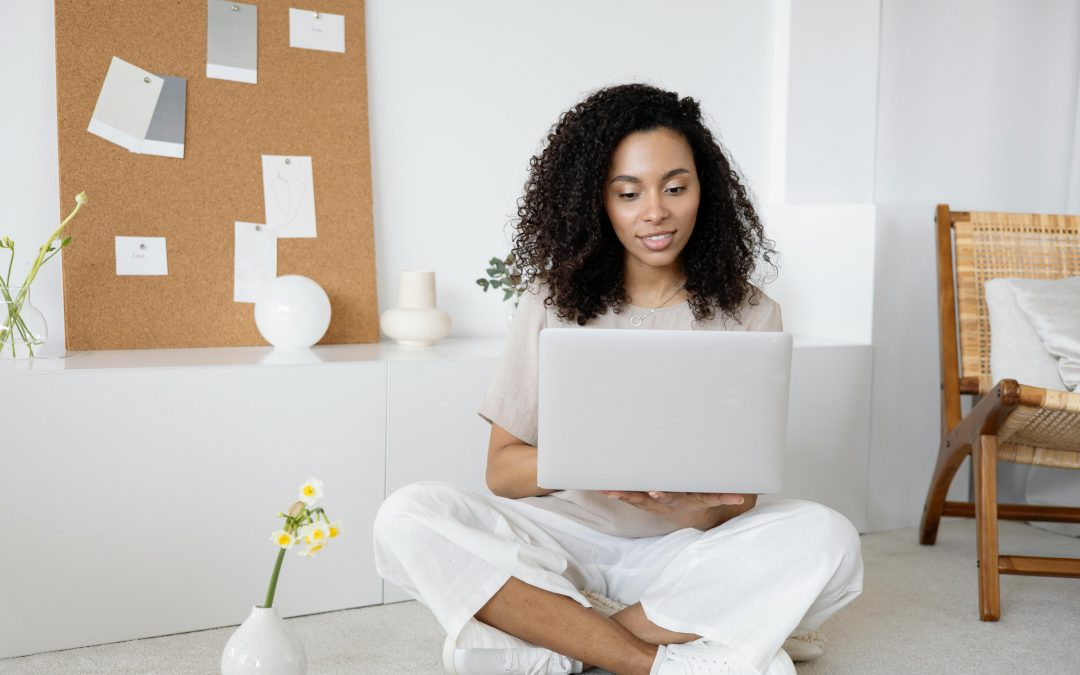 Person checking off tasks on a to-do list showing how to master time management for a balanced life